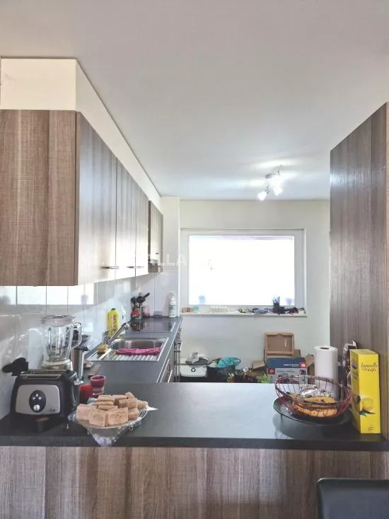 Appartement de 2.5 pièces au rez : Photo 2