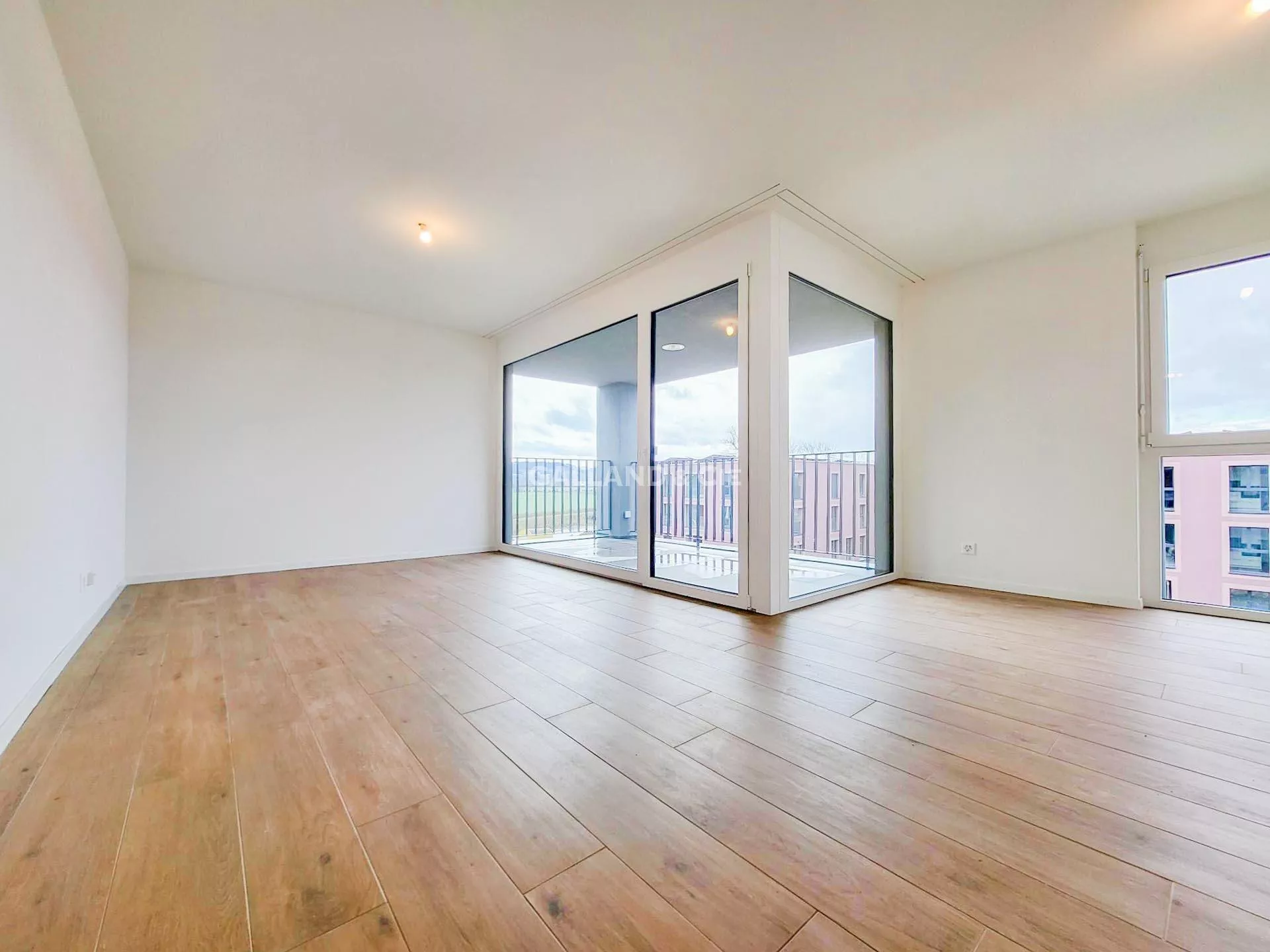 Appartement neuf au bord de la Petite-Glâne : Photo 2